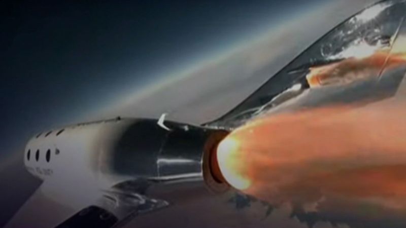 NextImg:Virgin Galactic launches tourists to space - finally | CNN Business