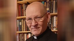 Father Michael Coren poses for a picture.