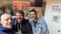 Pedro Pascal pictured outside the exhibition of pictures of himself in Margate, England, alongside art podcasters Robert Diamend (r) and actor Russell Tovey (l)