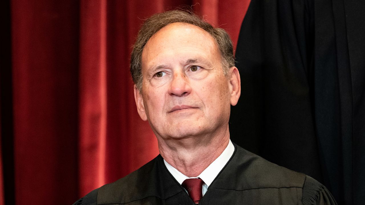 Associate Justice Samuel Alito sits during a group photo of the Justices at the Supreme Court in Washington on April 23, 2021.