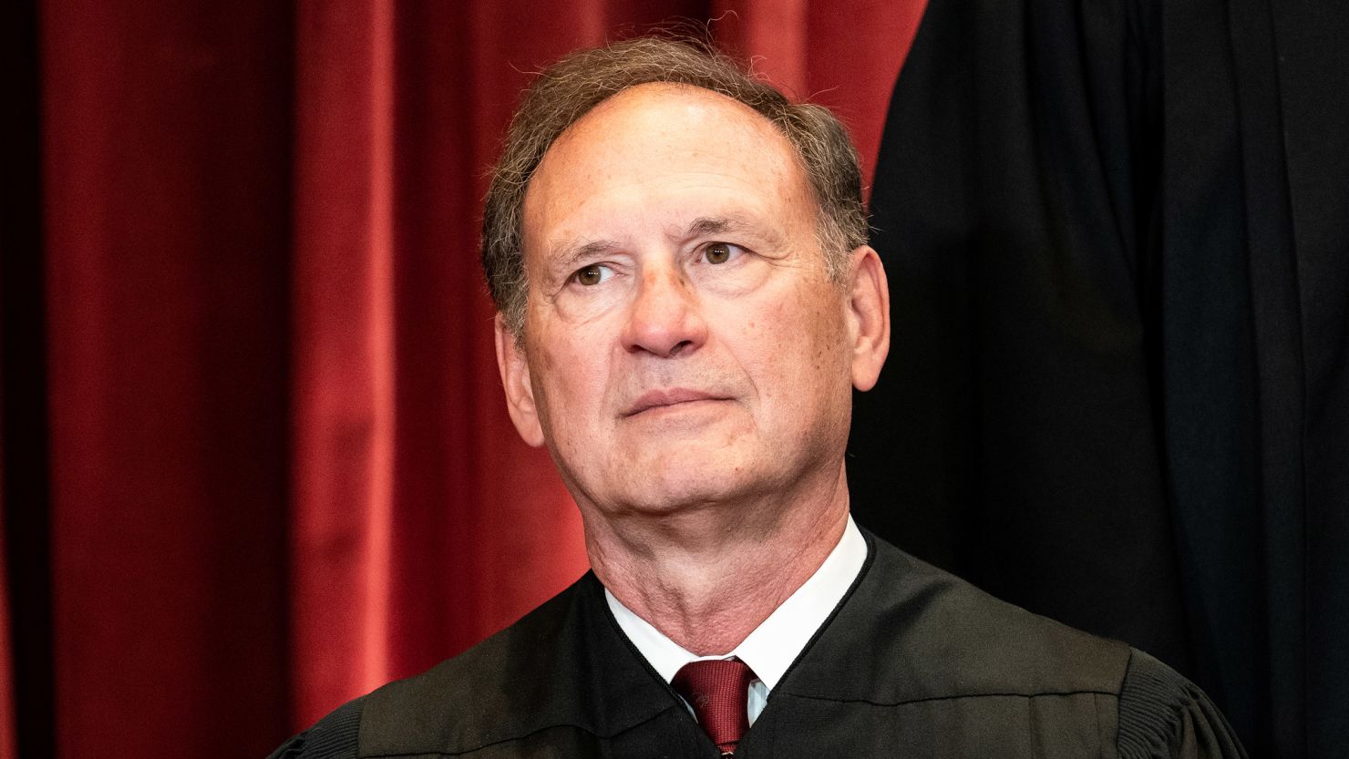 Associate Justice Samuel Alito sits during a group photo of the Justices at the Supreme Court in Washington on April 23, 2021.