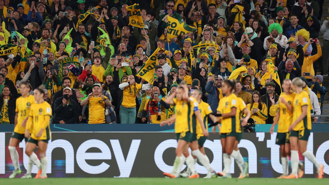 Fans react after Caitlin Foord of Australia scores against Denmark at Stadium Australia on August 7.