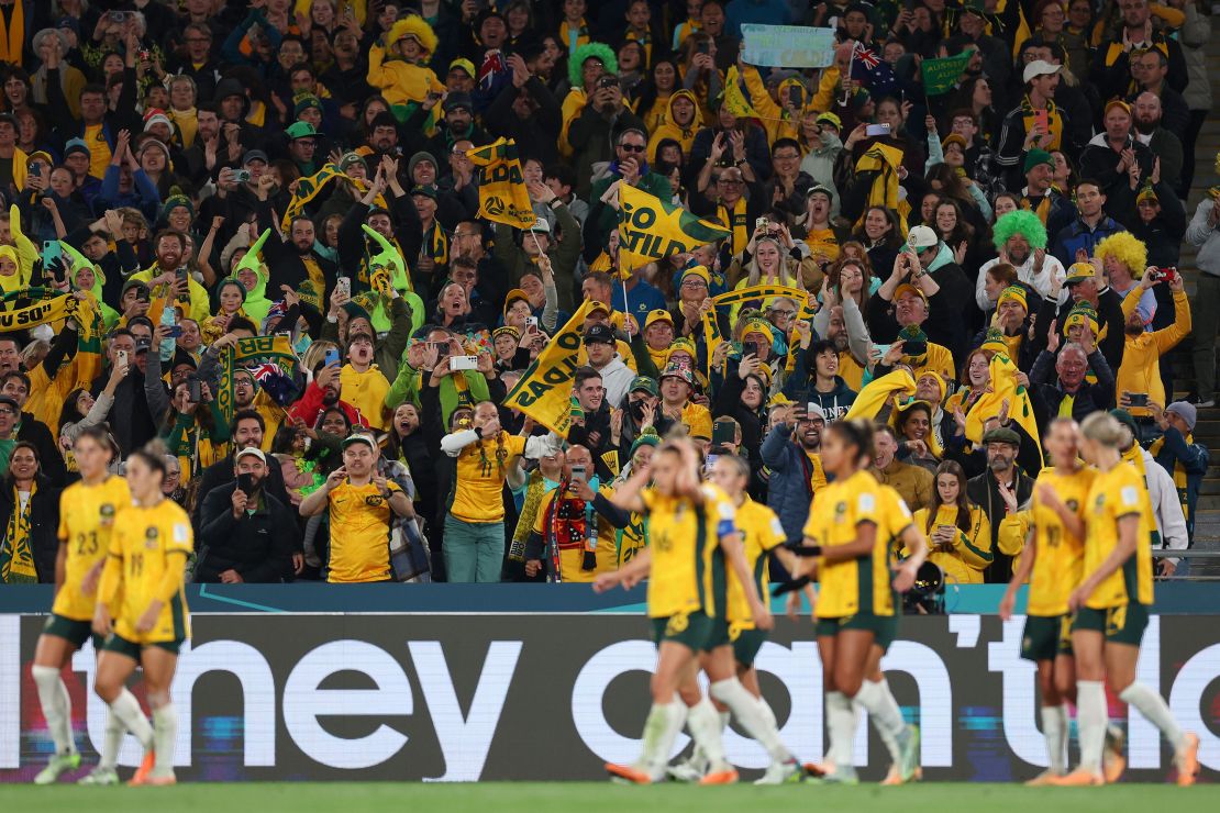 Fans react after Caitlin Foord of Australia scores against Denmark at Stadium Australia on August 7.