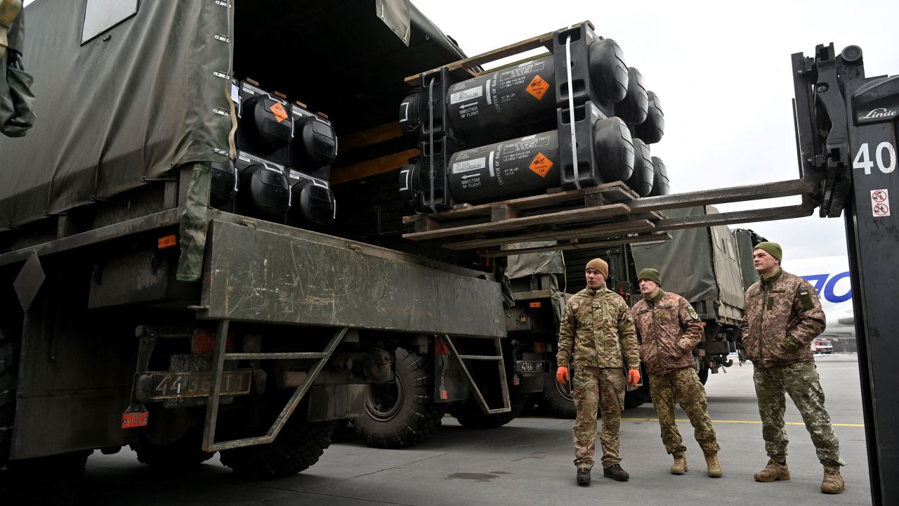 In this February 2022 photo, Ukrainian servicemen load a truck with the FGM-148 Javelin, an American man-portable anti-tank missile provided by US to Ukraine as part of a military support, upon its delivery at Kyiv's airport Boryspil.