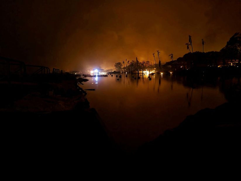Flames billow near Lahaina as wildfires driven by high winds destroy the historic town of Lahaina on Wednesday.