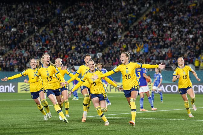 Sweden's Filippa Angeldal, second right, celebrates after scoring a penalty against Japan on Friday, August 11. <a href="index.php?page=&url=https%3A%2F%2Fwww.cnn.com%2F2023%2F08%2F11%2Ffootball%2Fjapan-sweden-womens-world-cup-spt-intl%2Findex.html" target="_blank">Sweden won 2-1</a> to book a spot in the semifinals.