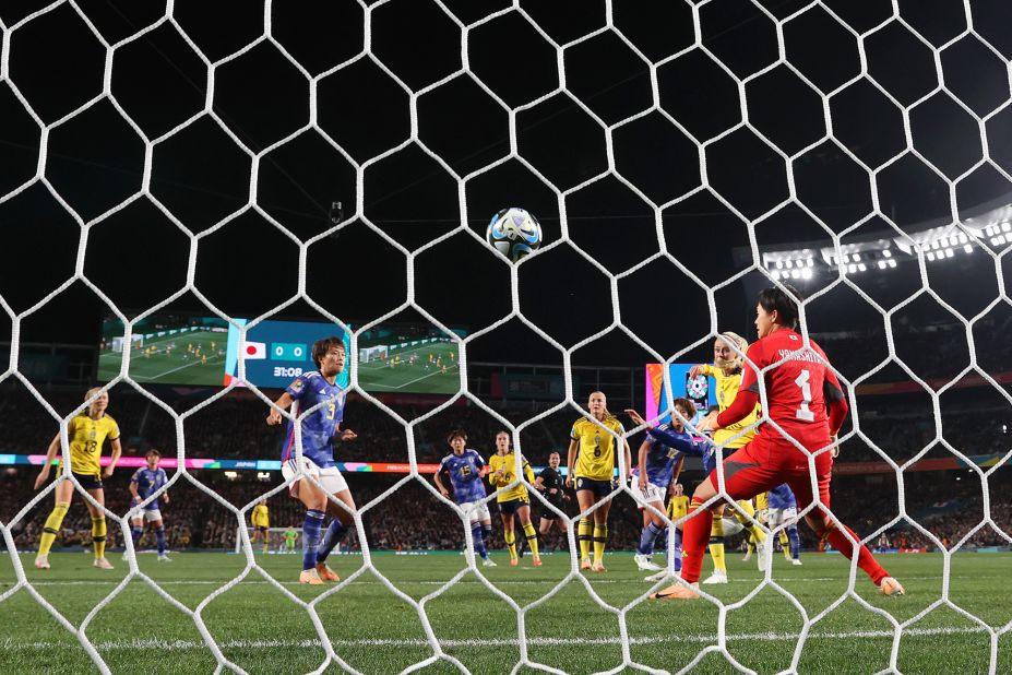 Amanda Ilestedt of Sweden scores her team's first goal past Ayaka Yamashita of Japan.