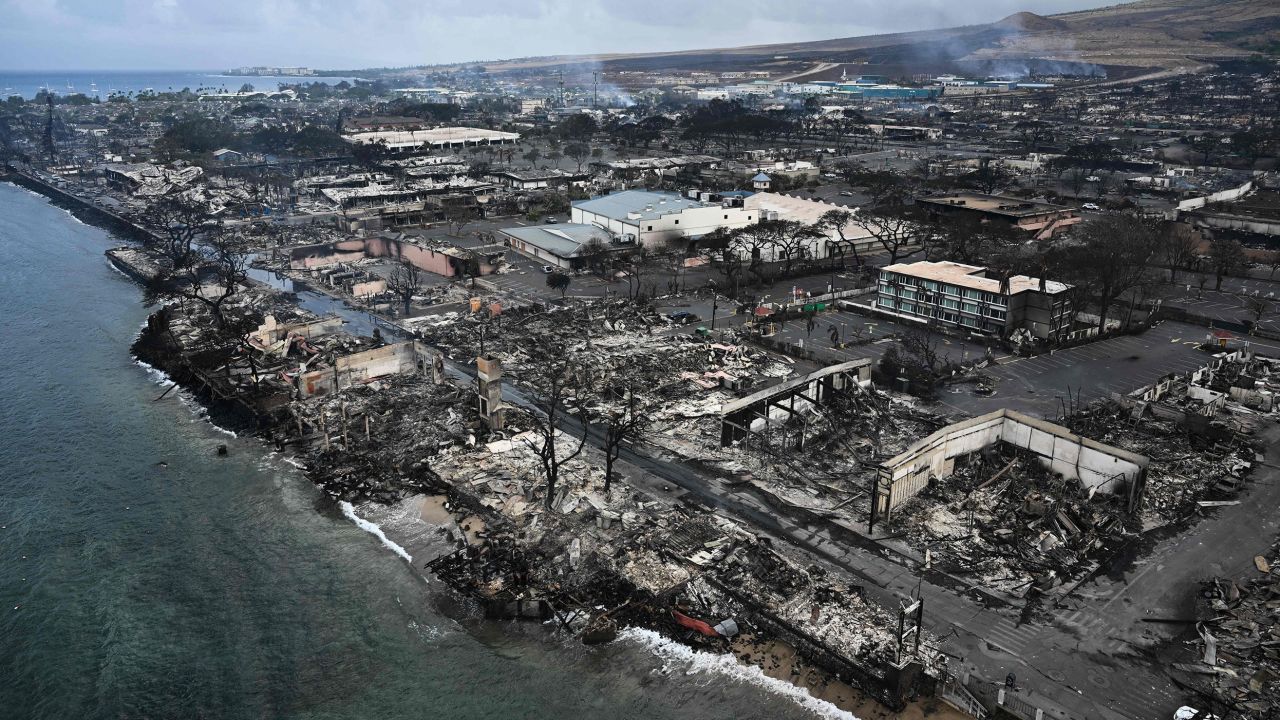 An aerial image taken on August 10 shows destroyed homes and buildings on the waterfront burned to the ground in Lahaina in the aftermath of wildfires in western Maui, Hawaii. 