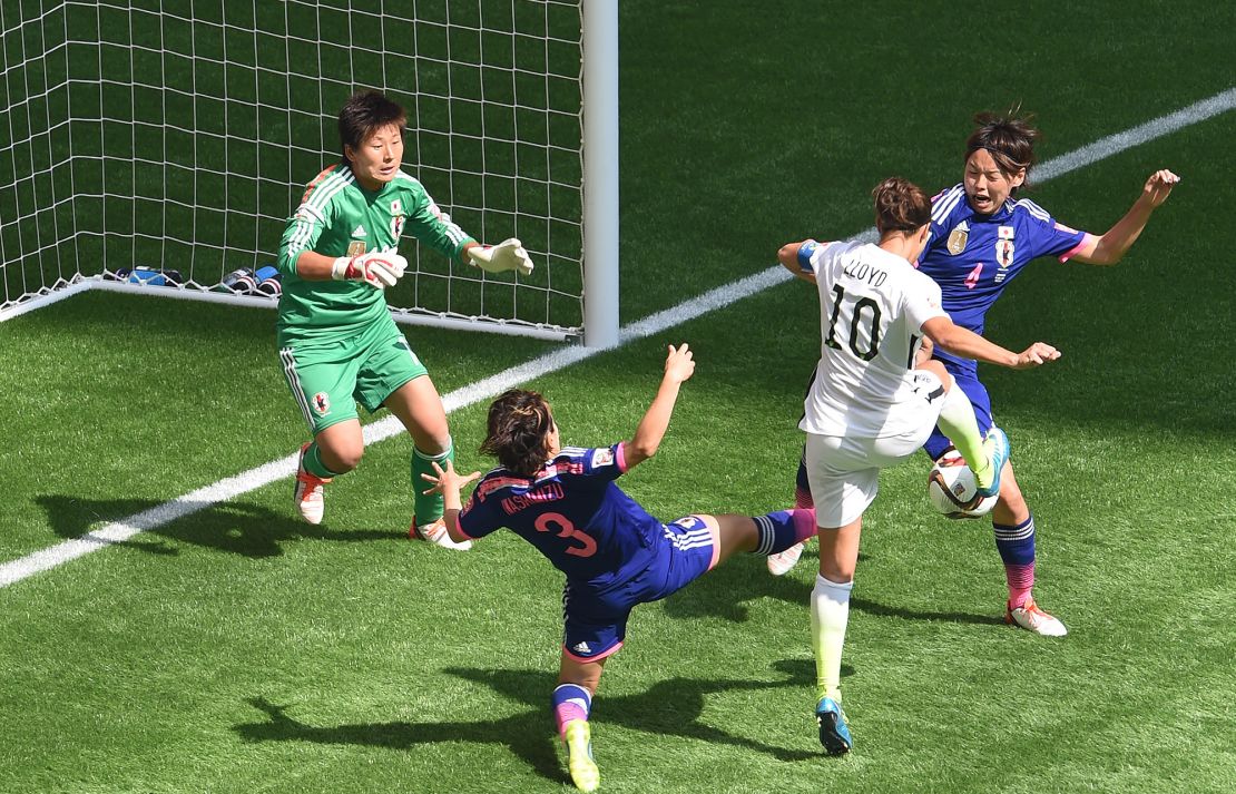 Carli Lloyd (2-R) from the United States scores a goal against Japan's goalkeeper Ayumi Kaihori (L) Azusa Washimizu and Saki Kumagai (R) during the FIFA Women's World Cup 2015 final soccer match between USA and Japan at the BC Place Stadium in Vancouver, Canada, 05 July 2015. Photo by: Carmen Jaspersen/picture-alliance/dpa/AP Images