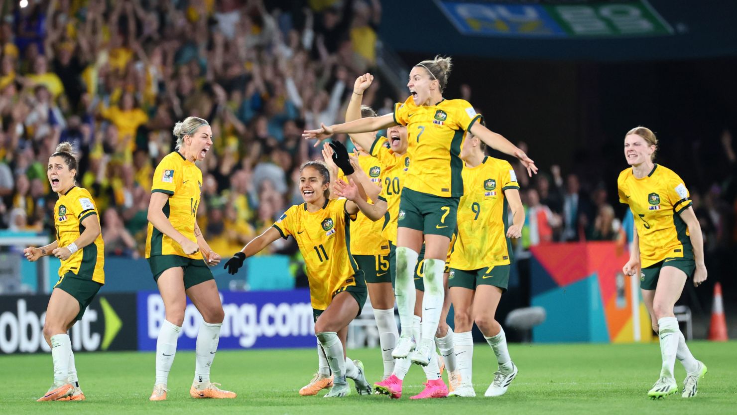 Australia's players celebrate winning on penalties. 