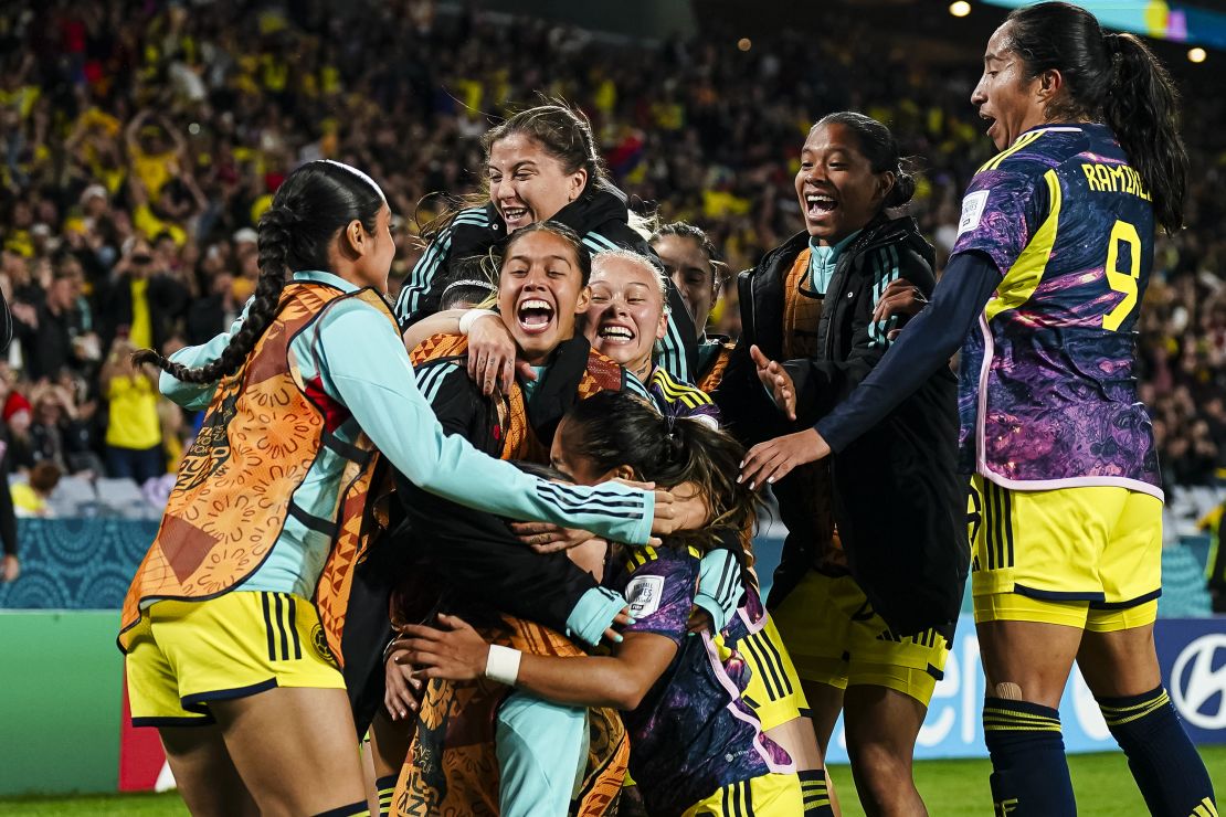 Leicy Santos celebrates with her teammates. 