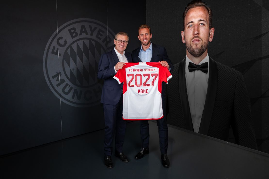 MUNICH, GERMANY - AUGUST 11: (EXCLUSIVE COVERAGE) CEO Jan-Christian Dressen of FC Bayern Muenchen and Harry Kane of FC Bayern Muenchen during the unveiling of his signing on August 11, 2023 in Munich, Germany. (Photo by S. Mellar/FC Bayern via Getty Images)