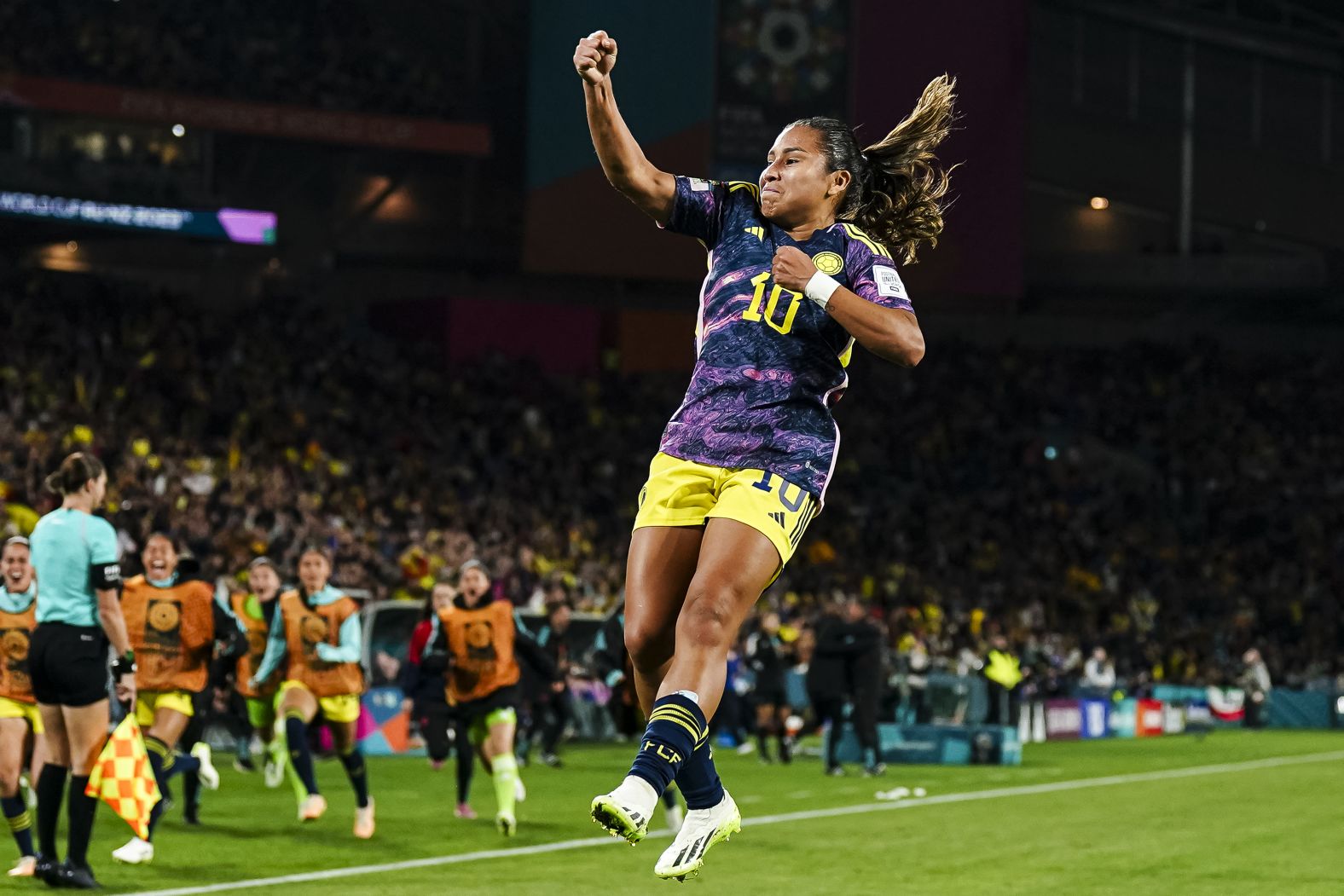 Leicy Santos celebrates her goal that gave Colombia a 1-0 lead against England.