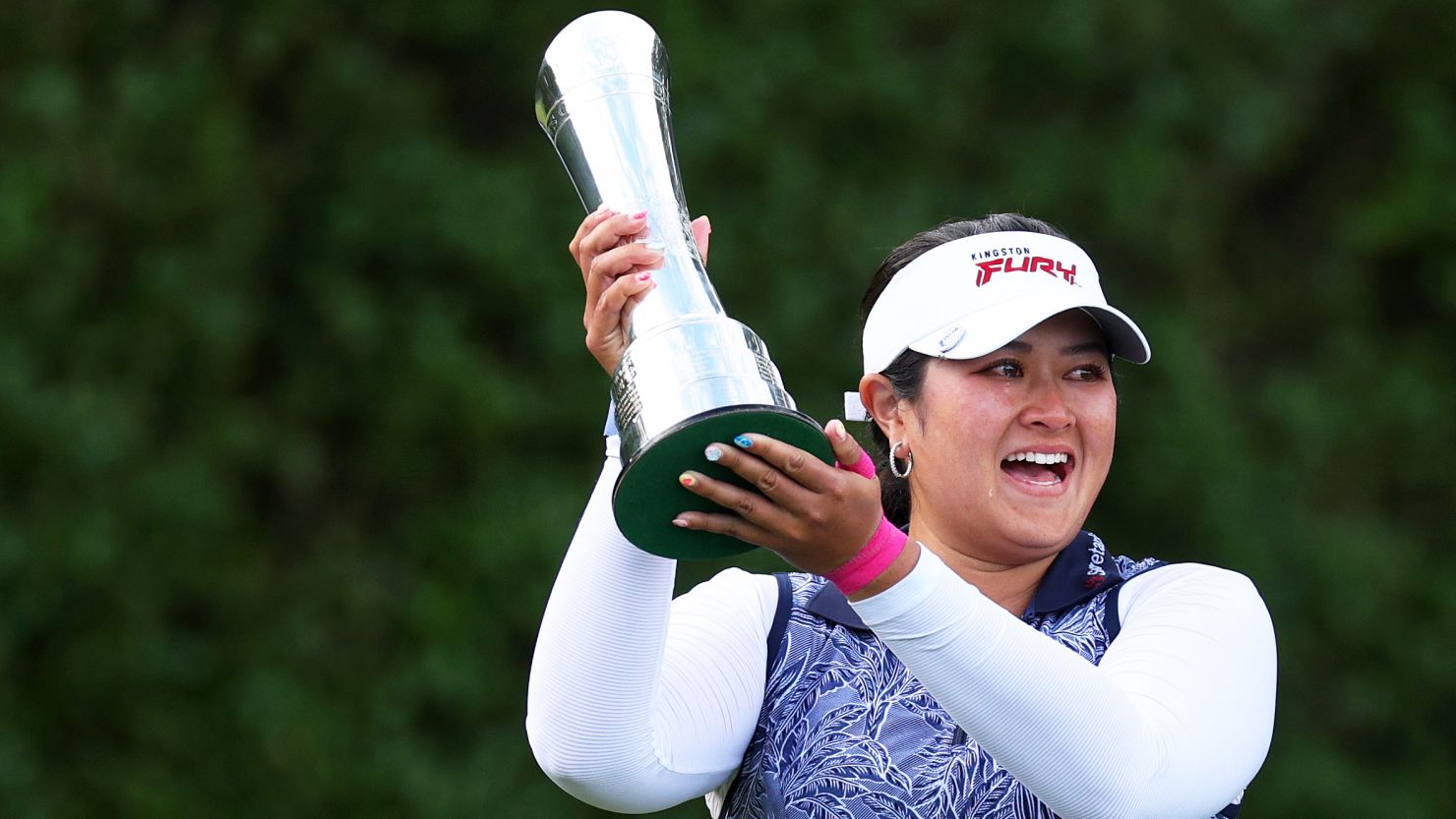 Lilia Vu of the United States lifts the AIG Women's Open Trophy on Day Four of the AIG Women's Open at Walton Heath Golf Club on August 13, 2023 in Tadworth, England.