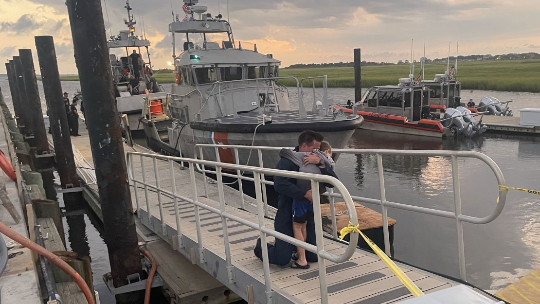 The search for the missing divers went into the night before the men were found.