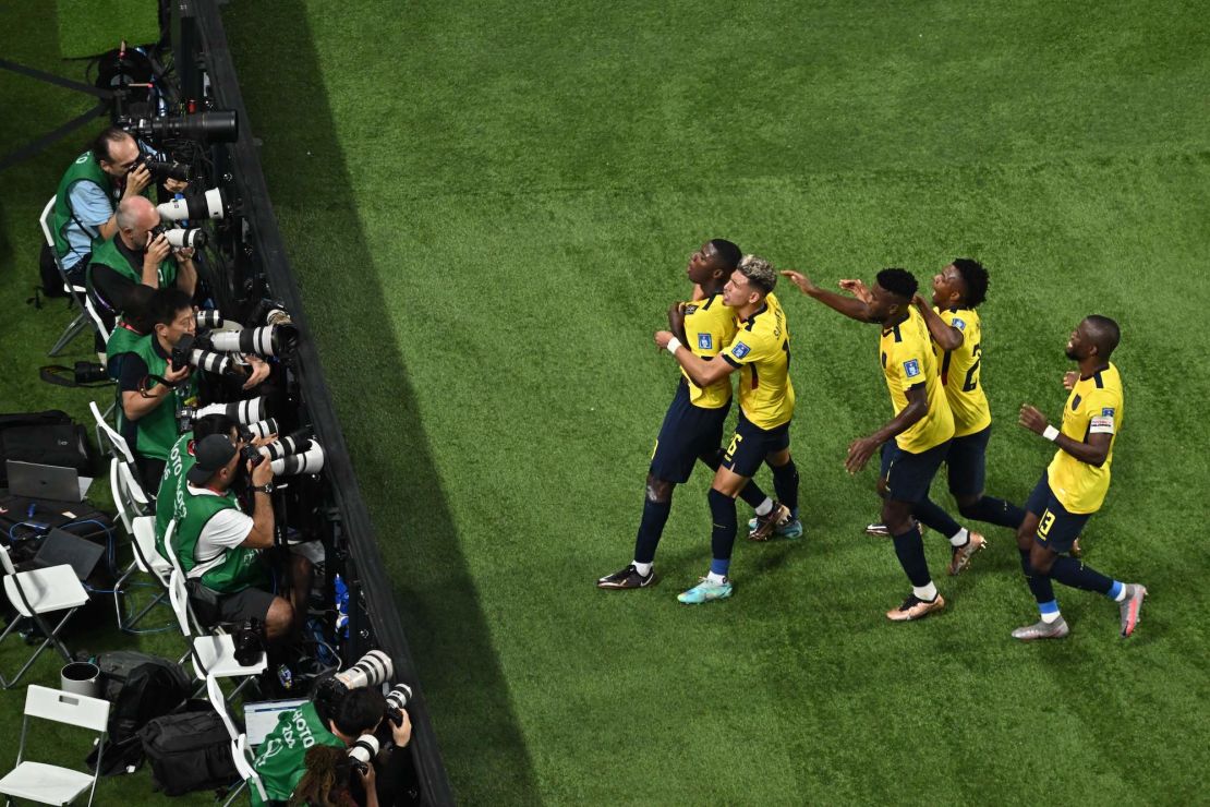 Ecuador's midfielder #23 Moises Caicedo celebrates with teammates after scoring his team's first goal during the Qatar 2022 World Cup Group A football match between Ecuador and Senegal at the Khalifa International Stadium in Doha on November 29, 2022. (Photo by MANAN VATSYAYANA / AFP) (Photo by MANAN VATSYAYANA/AFP via Getty Images)