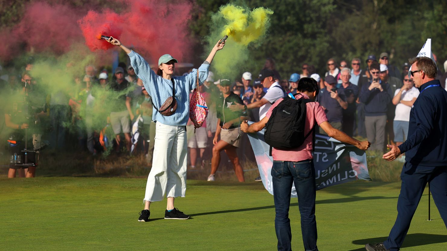 TADWORTH, ENGLAND - AUGUST 13: Protestors make their way onto the 17th green on Day Four of the AIG Women's Open at Walton Heath Golf Club on August 13, 2023 in Tadworth, England. (Photo by Andrew Redington/Getty Images)