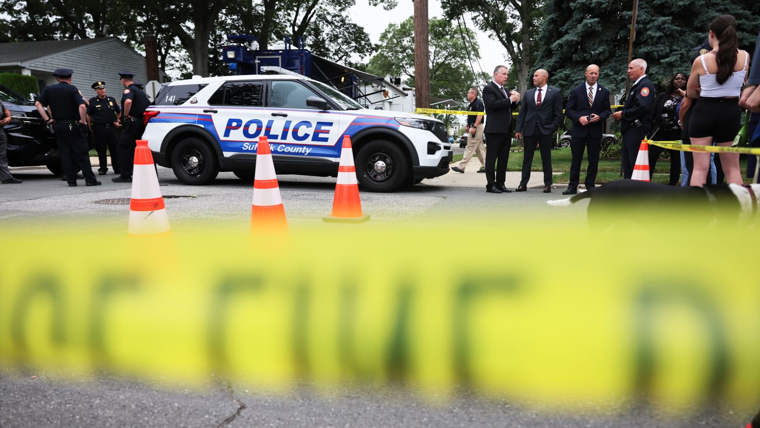 MASSAPEQUA PARK, NEW YORK - JULY 14: Law enforcement officials are seen as they investigate the home of a suspect arrested in the unsolved Gilgo Beach killings on July 14, 2023 in Massapequa Park, New York. A suspect in the Gilgo Beach killings was arrested in the unsolved case tied to at least 10 sets of human remains that were discovered since 2010 in suburban Long Island.  The suspect Rex Heuermann is expected to be arraigned after his arrest Thursday night.  (Photo by Michael M. Santiago/Getty Images)