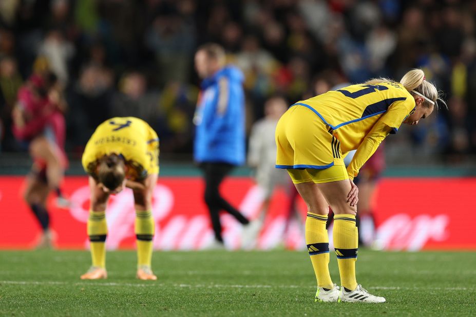 Swedish players are dejected following the 2-1 loss to Spain.