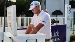 MEMPHIS, TENNESSEE - AUGUST 13: Lucas Glover of the United States cools off in the ice on the 18th tee during the final round of the FedEx St. Jude Championship at TPC Southwind on August 13, 2023 in Memphis, Tennessee. (Photo by Andy Lyons/Getty Images)