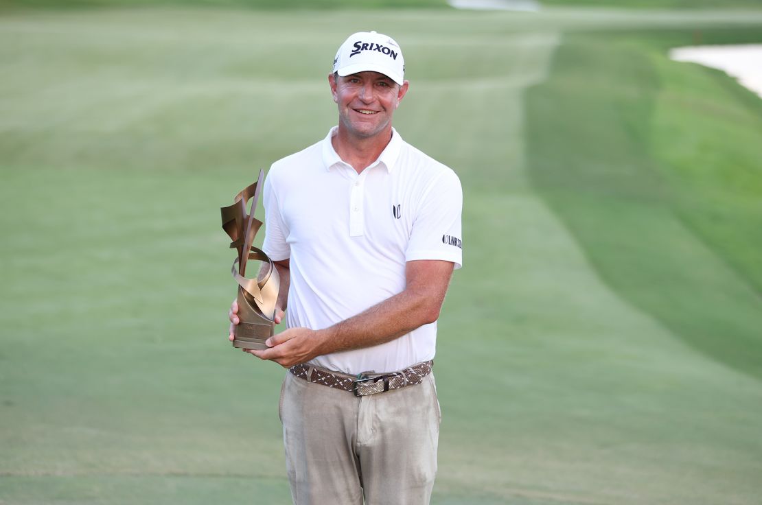 MEMPHIS, TENNESSEE - AUGUST 13: Lucas Glover of the United States poses with the trophy after putting in to win during the first playoff hole on the 18th green to win the tournament during the final round of the FedEx St. Jude Championship at TPC Southwind on August 13, 2023 in Memphis, Tennessee. (Photo by Gregory Shamus/Getty Images)