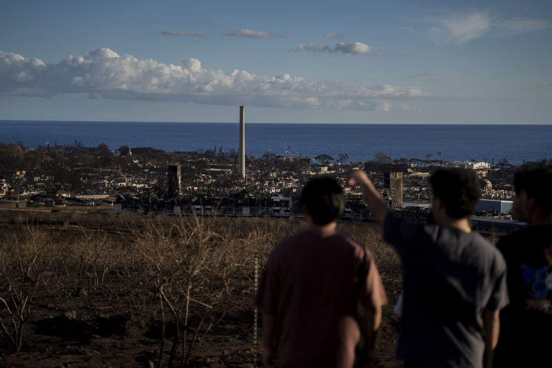 People looking down to downtown Lahaina from Lahaina Bypass in Lahaina, Hawaii on August 13, 2023.