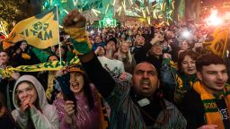Matildas fans cheer at Melbourne's Federation Square cheer for the victory of the FIFA Women's World Cup Quarter Final match between Australia and France at Brisbane Stadium, on August 12, 2023 in Melbourne, Australia. 