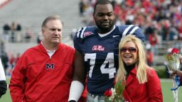 OXFORD, MS - NOVEMBER 28:  Michael Oher #74 of the Ole Miss Rebels stands with his family during senior ceremonies prior to a game against the Mississippi State Bulldogs at Vaught-Hemingway Stadium on November 28, 2008 in Oxford, Mississippi.  (Photo by Matthew Sharpe/Getty Images)