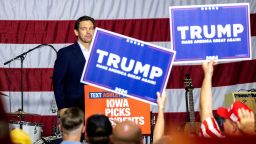 Republican U.S. presidential candidate and Florida Governor Ron DeSantis looks into the crowd after speaking as supporters of former President Donald Trump hold up signs during the Ashley's BBQ Bash fundraiser at Hawkeye Downs in Cedar Rapids, Iowa, U.S. August 6, 2023. 