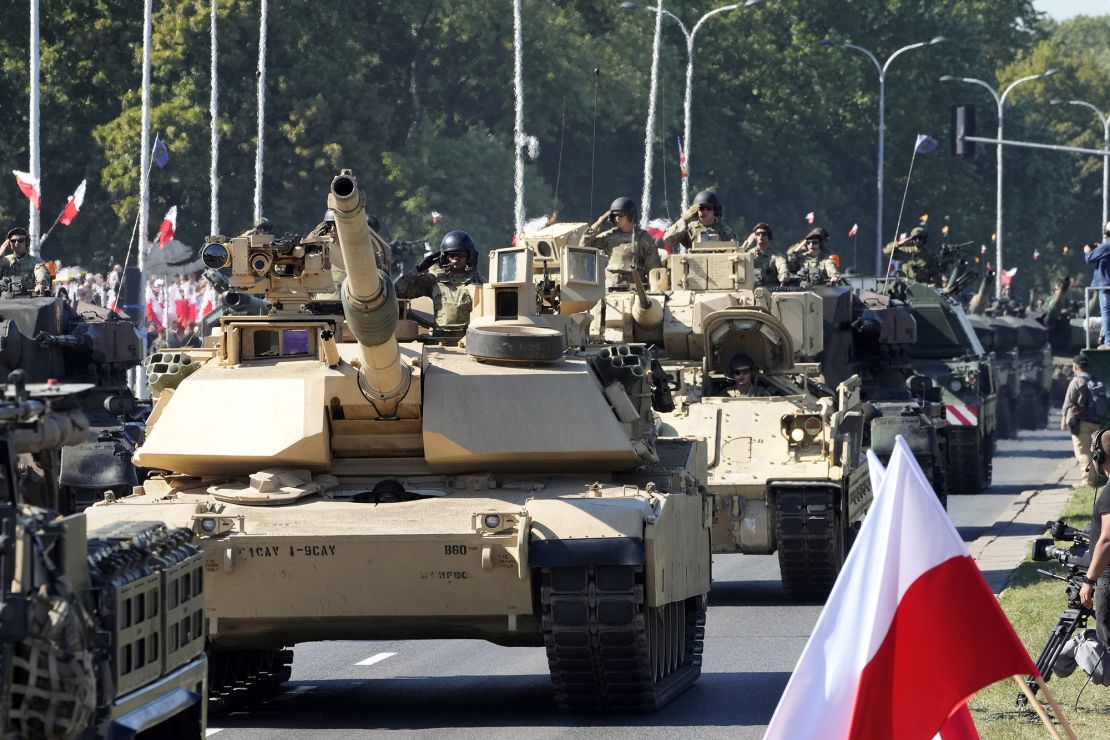 US-made Abrams tanks are displayed during a massive military parade to celebrate the Polish Army Day in Warsaw.