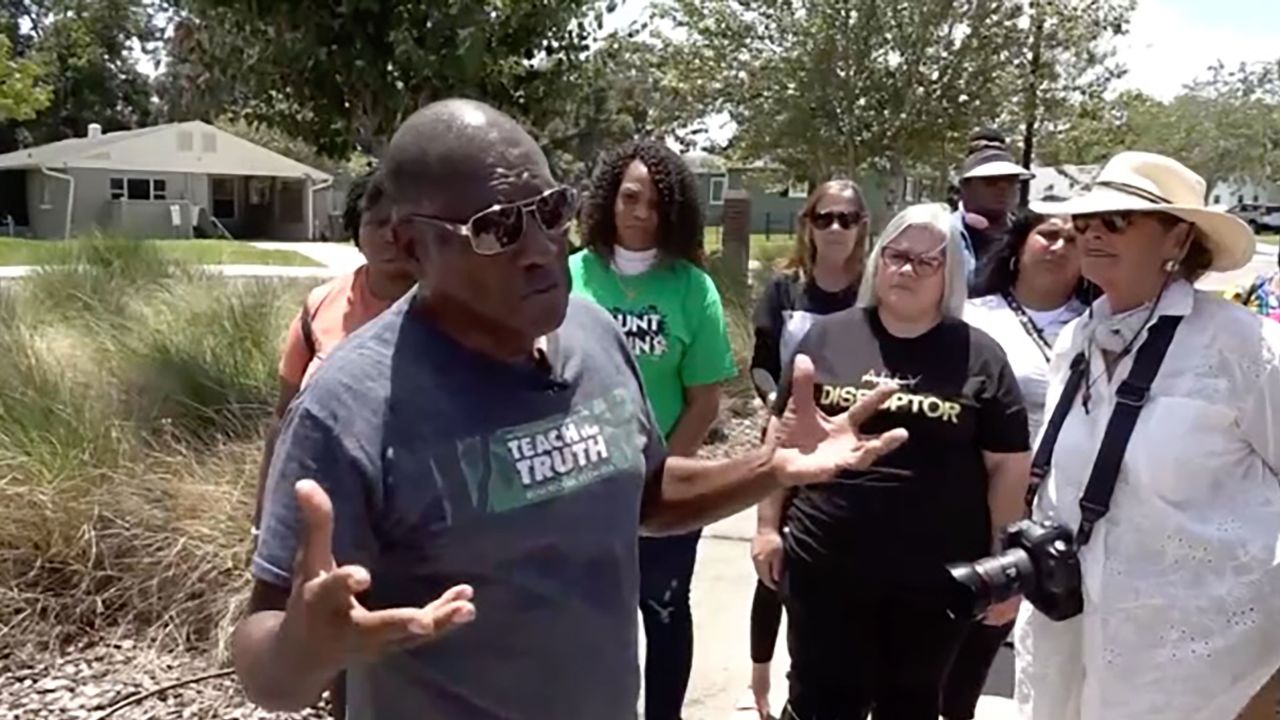 Miami-based historian Marvin Dunn speaks with a group of teachers about the events surrounding the massacre.