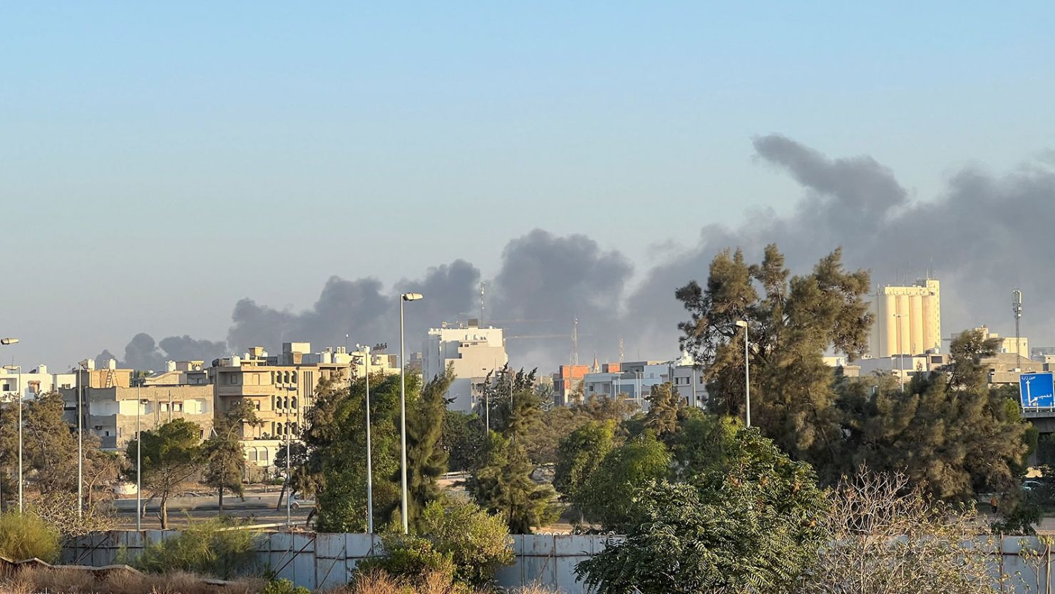 Smoke rises amid clashes between armed factions, in Tripoli, Libya August 15, 2023. REUTERS/Ayman al-Sahili