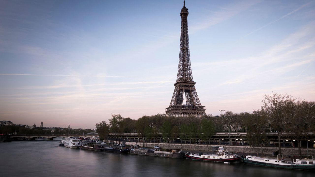 The Eiffel Tower were two American tourists spent the night after being found asleep by security staff.