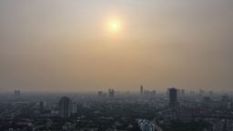 An aerial view shows the Jakarta skyline with poor air quality levels on August 11, 2023. 
