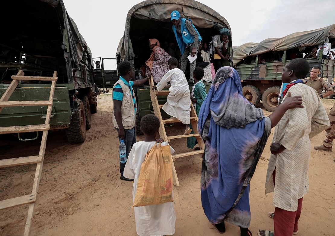 Sudanese people travel to a refugee camp in Ourang on the outskirts of Adre, Chad in July. More than one million people have fled Sudan into neighboring countries since April, the UN reported.