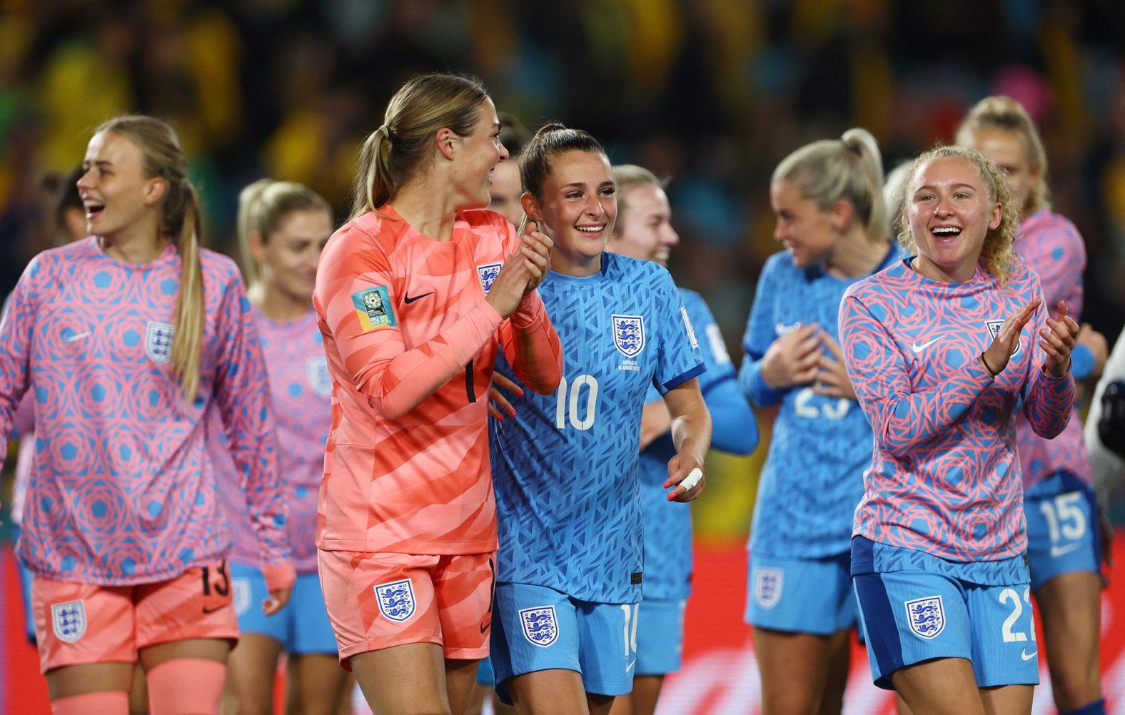 England players celebrate after their <a href="index.php?page=&url=http%3A%2F%2Fwww.cnn.com%2F2023%2F08%2F15%2Ffootball%2Faustralia-england-womens-world-cup-semifinal-spt-intl%2Findex.html" target="_blank">3-1 victory over Australia</a> booked a spot in the final.