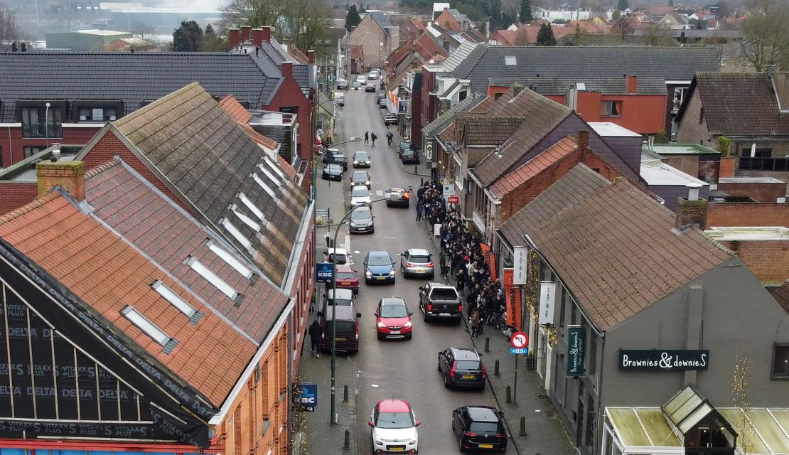 BRUSSELS, BELGIUM - DECEMBER 29: A drone photo shows that people wait in queue to buy fireworks at Belgian-Dutch border town of Baarle, Belgium as Netherlanders arrive at the town for fireworks after Dutch government ban the sale and use of fireworks in the Netherlands during New Year celebrations on December 29, 2021. (Photo by Dursun Aydemir/Anadolu Agency via Getty Images)