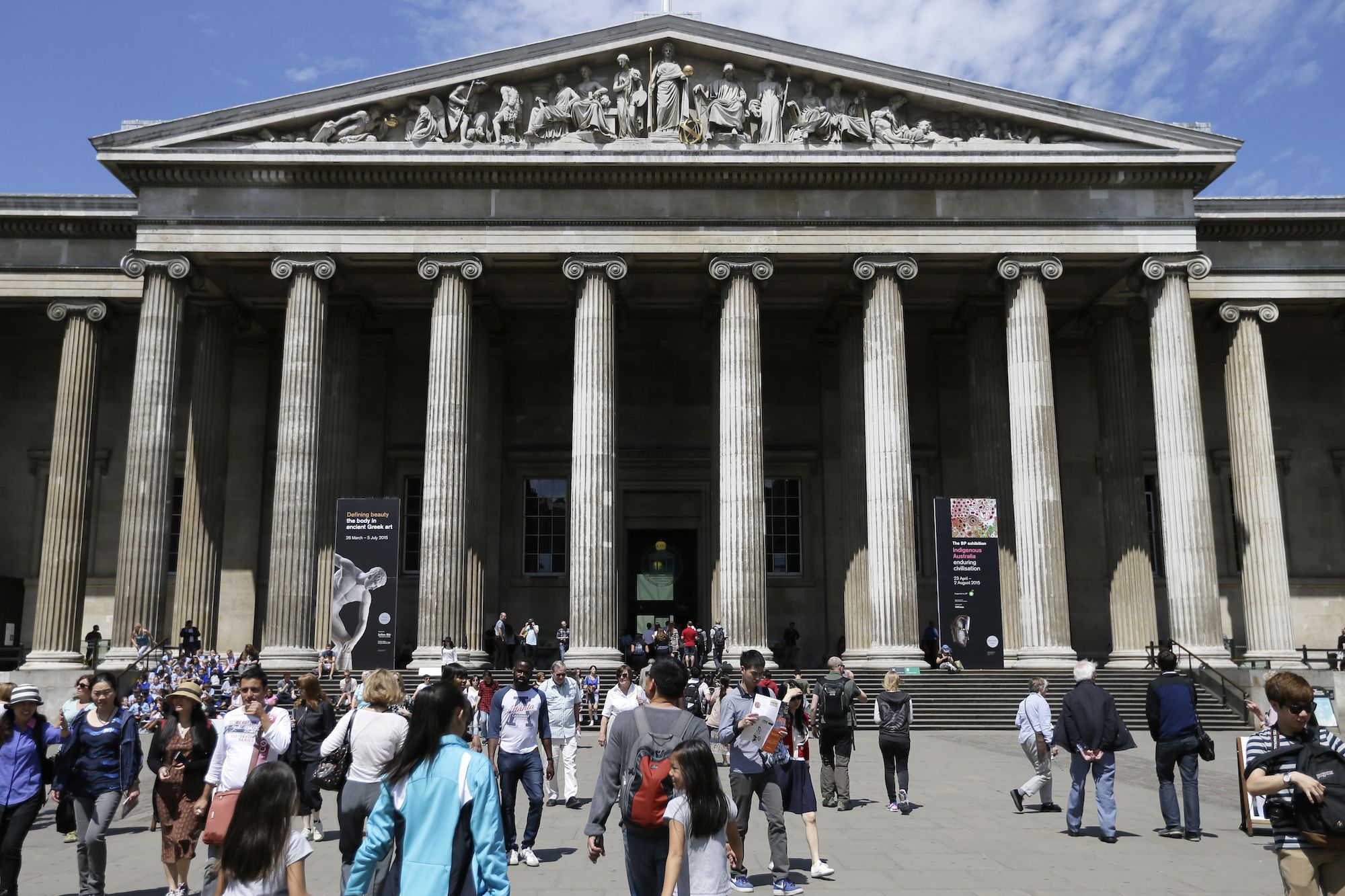 Visitors pictured on the steps of the British Museum in London on June 26, 2015