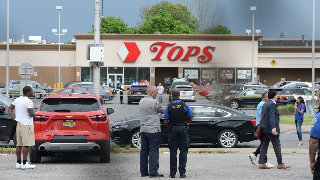 BUFFALO, NY - MAY 14: Buffalo Police on scene at a Tops Friendly Market on May 14, 2022 in Buffalo, New York. According to reports, at least 10 people were killed after a mass shooting at the store with the shooter in police custody. (Photo by John Normile/Getty Images)
