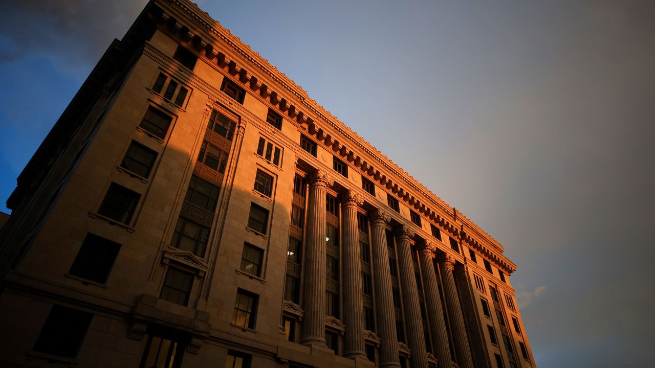 The sun sets on the Fulton County Courthouse, Monday, Aug. 14, 2023, in Atlanta. 