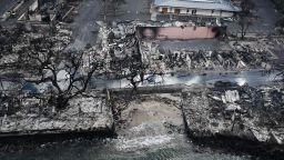 An aerial image taken on August 10, 2023 shows destroyed homes and buildings on the waterfront burned to the ground in Lahaina in the aftermath of wildfires in western Maui, Hawaii. 