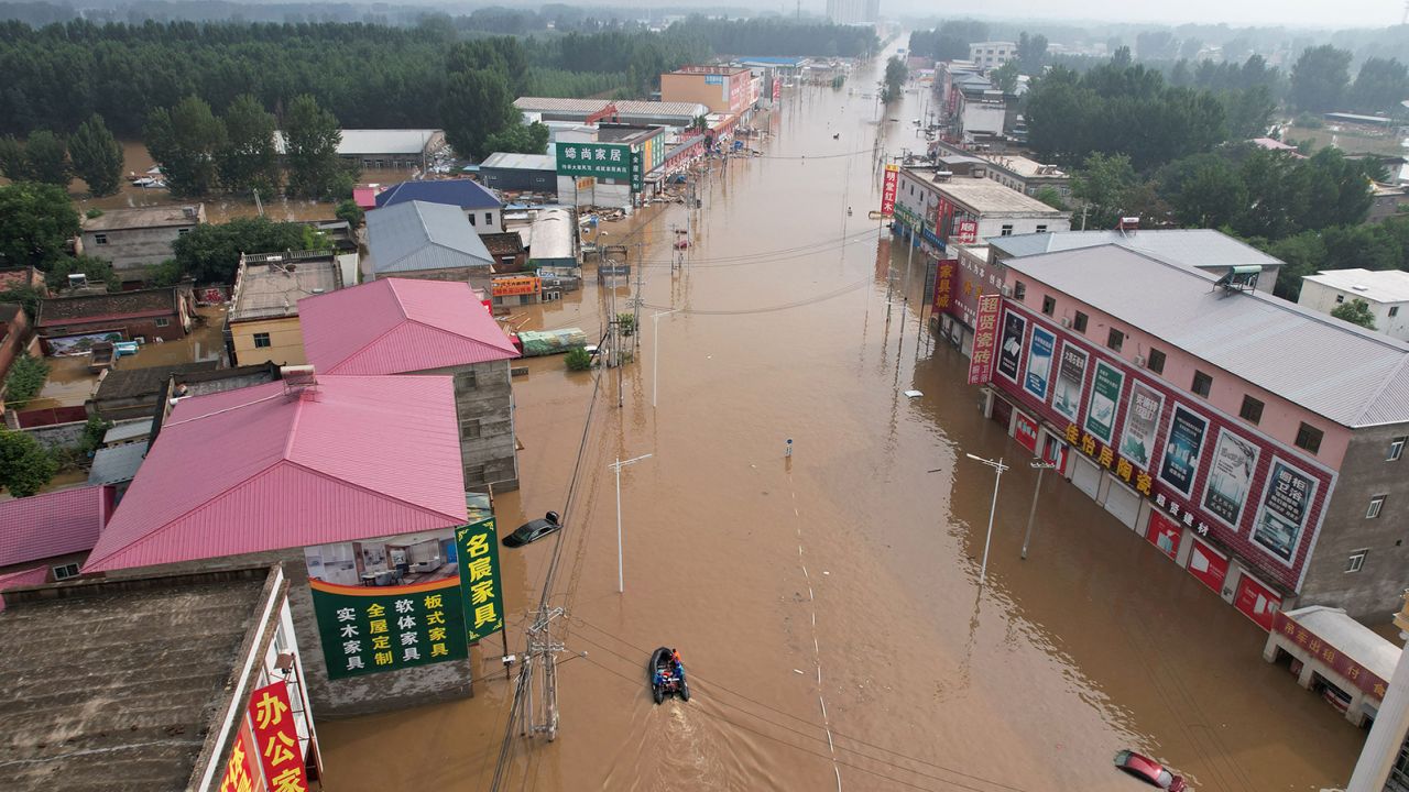 This aerial view shows a flooded village in Zhuozhou after heavy rains on August 2.