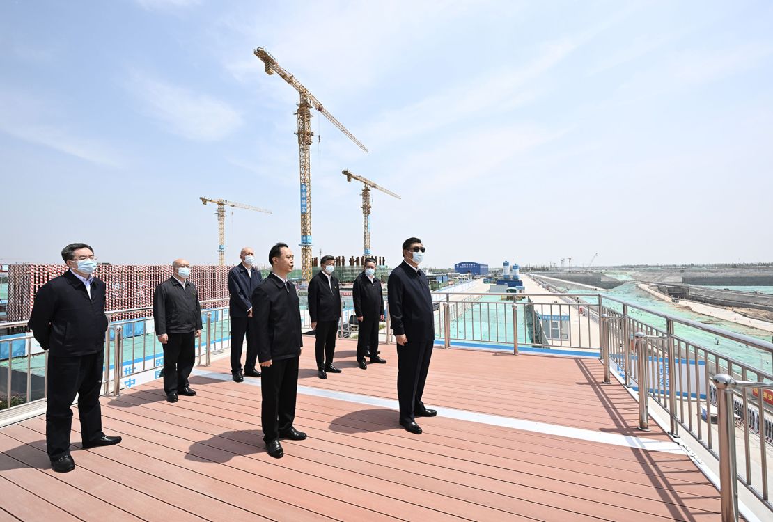 Chinese leader Xi Jinping inspects the construction sites of a railway station and an international trade center in Xiong'an on May 10.