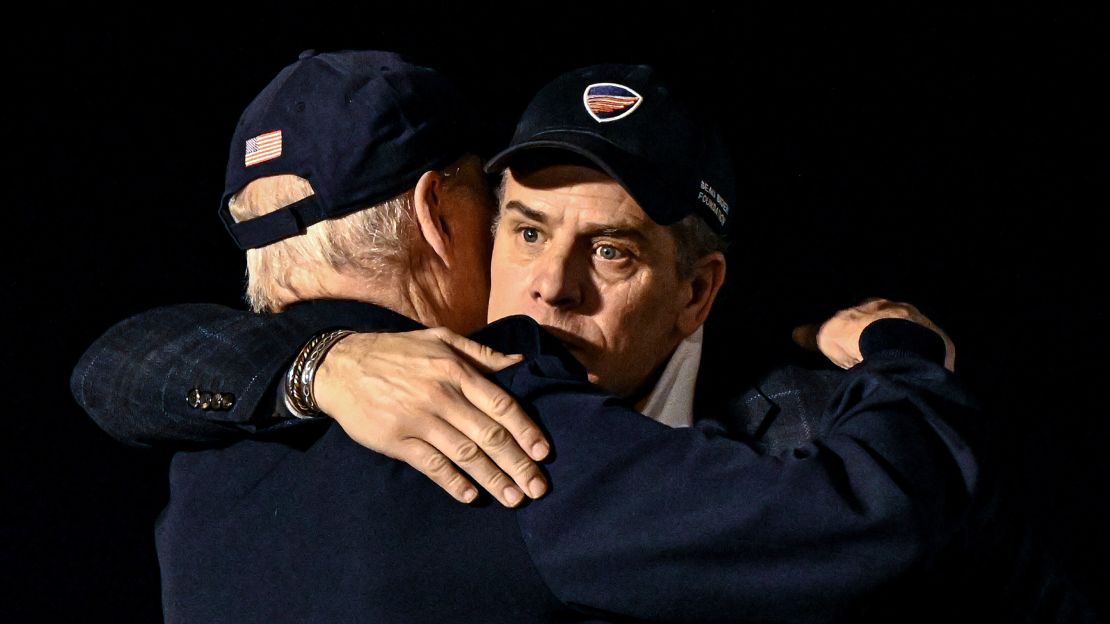 President Joe Biden hugs his son Hunter Biden upon returning from a trip to Ireland, at Dover Air Force Base, in Delaware, on April 14. 