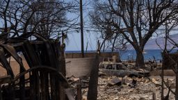 Destroyed buildings and cars are seen in the aftermath of the Maui wildfires in Lahaina, Hawaii on August 16, 2023. The number of people known to have died in the horrific wildfire that levelled a Hawaiian town reached 106 on August 15, authorities said, as a makeshift morgue was expanded to deal with the tragedy. Governor Josh Green has repeatedly warned that the final toll from last week's inferno in Lahaina, already the deadliest US wildfire in over a century, would grow significantly, urging Hawaiians to gird for a number that could be two or three times its present level. 