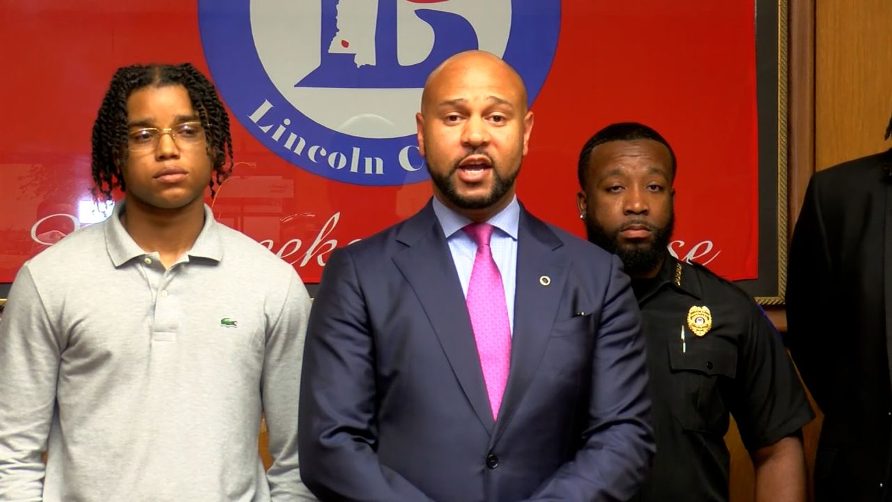 D'Monterrio Gibson and his attorney Carlos Moore
