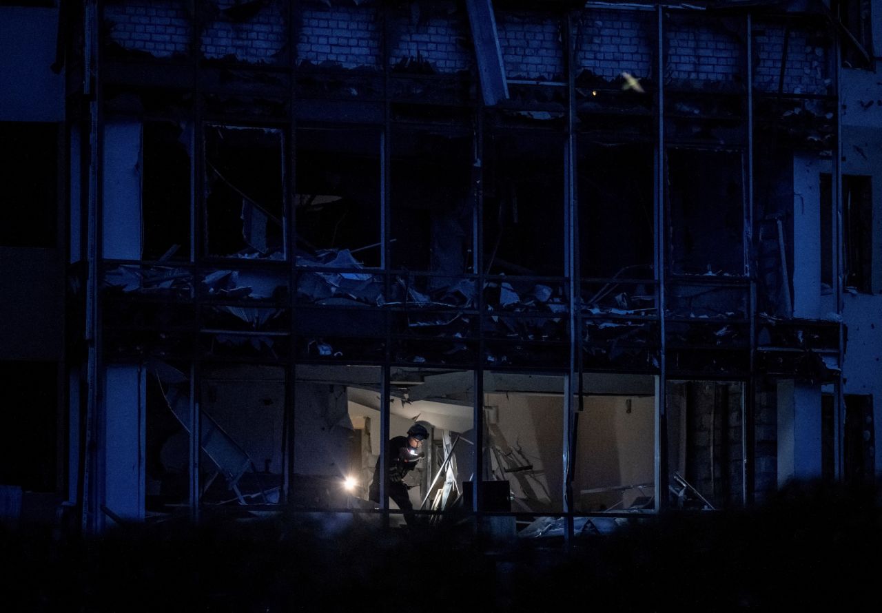 An expert works at the site of a Russian missile strike in Zaporizhzhia, Ukraine, on Thursday, August 10. <a href="https://www.cnn.com/europe/live-news/russia-ukraine-war-new-08-10-23/h_af2dfb2057917fa737b339a18f5394a6" target="_blank">A hotel in Zaporizhzhia</a> was hit by Russian missiles, leaving one dead and 16 others injured, according to Ukrainian officials.