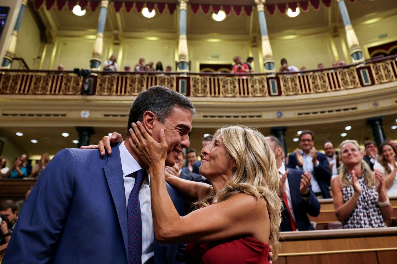 Pedro Sánchez, Spain's acting prime minister, is greeted by Second Deputy Prime Minister Yolanda Díaz on the day of a parliament session in which lawmakers voted for a speaker and for members of parliament's executive board on Thursday, August 17. The speaker vote was won by Francina Armengol.