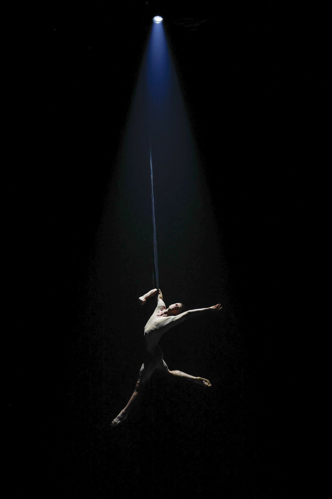 A dancer performs during IMA (Pray), an immersive circus show in Edinburgh, Scotland, on Thursday, August 10.