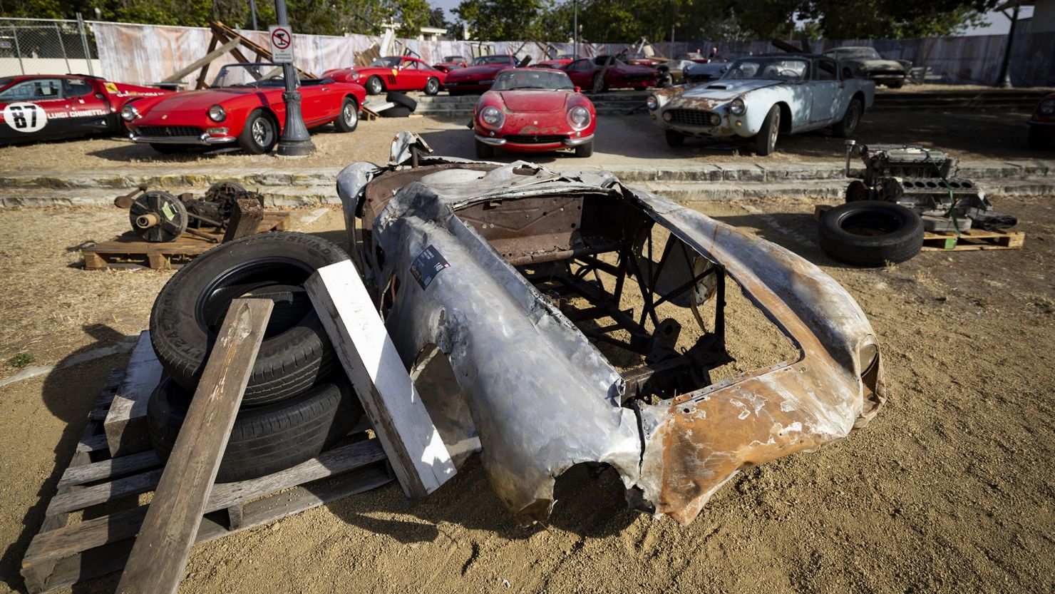 The 1945 Ferrari 500 Mondial Spider exhibited in a faux junkyard setting ahead of RM Sotheby's Monterey auction..